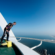 Illustration for article titled Red Bull F1 Did Donuts On Top Of The 689-Foot Burj Al Arab Helipad